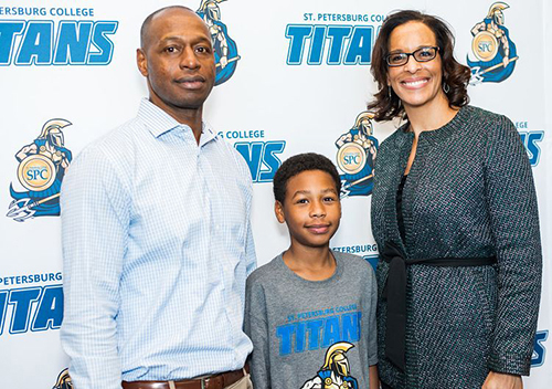 Jonathan Bristol, his son and Michelle Robinson, Vice President of Government Affairs at Verizon