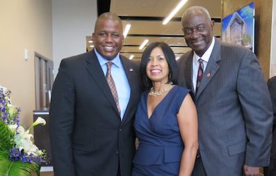 Bill McCloud (right) and his wife Elaine pose with Former U.S. Representative Kendrick Meek