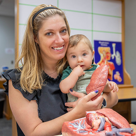 portrait of Laura Lekovish and her baby