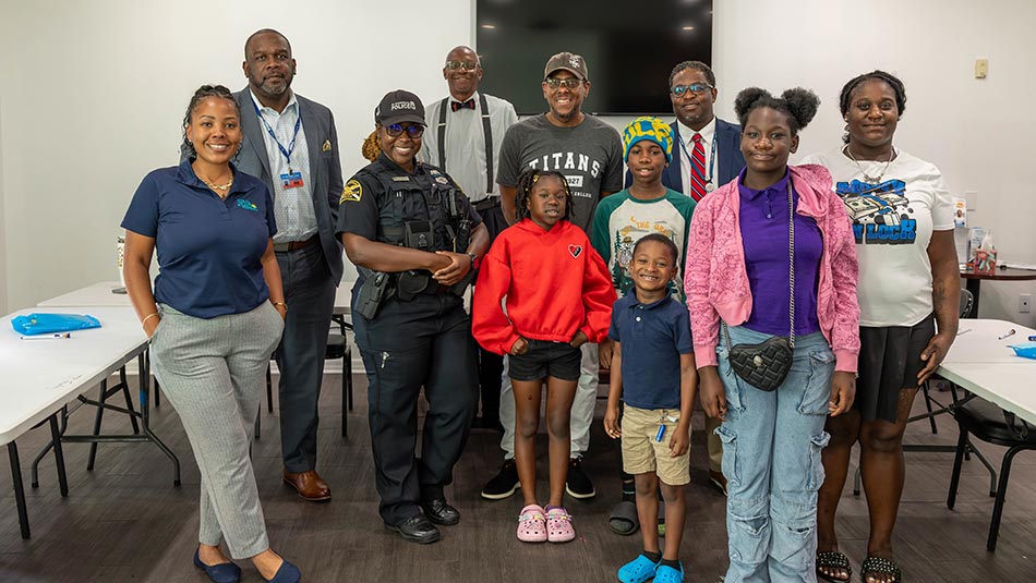 SPC staff and mentors engage with Jordan Park youth during a CARE event, providing insight into diverse career paths and encouraging aspirations beyond their neighborhood.