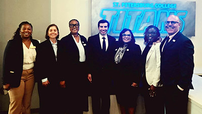 SPC leaders stand in a group photo with Acting U.S. Secretary of Labor Keith Sonderling
