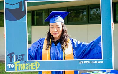 close up view of a First to Finished female graduate