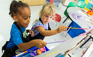 two children painting