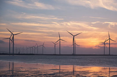 windmills over the ocean