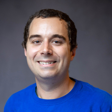 portrait of eugene helfrick wearing a blue t shirt