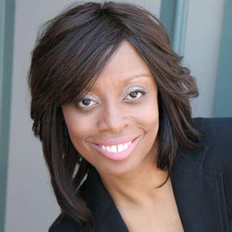 portrait of Latresha Moore wearing a black suit jacket