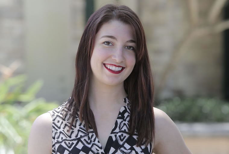 Megan Regalado smiling at the camera