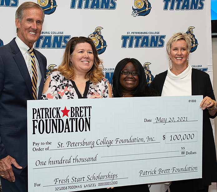 SPC Foundation team accepting a donation check from the Patrick Brett Foundation