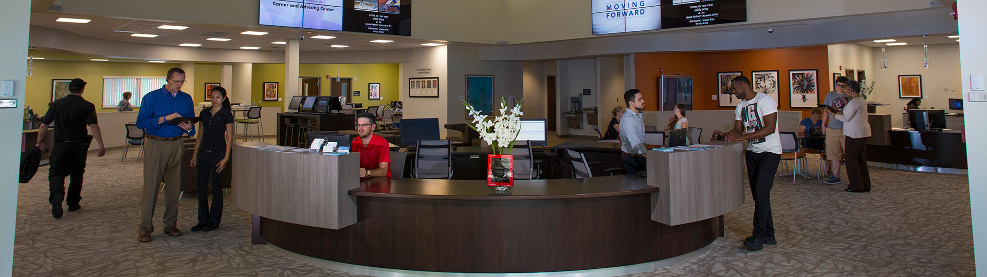 Many people interacting during a day of normal activities at the Career and Advising Center