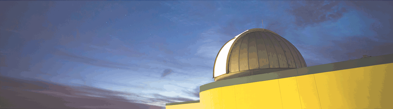 image of a blue sky with the SPC Observatory in the background